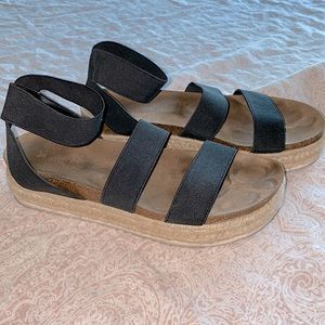 Black Platform sandals with weave details